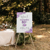 silver and purple 80th birthday welcome sign